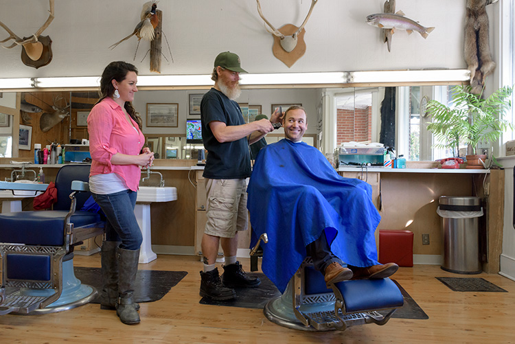 Bill Stolberg gives Riley Hollenbaugh a trim at Bill's Barber Shop.