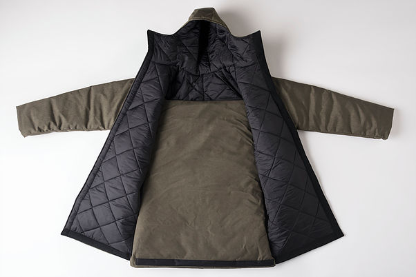 The Empowerment Plan's EMPWR coat, which is self-heated, waterproof, and doubles as a sleeping bag or carrying bag.