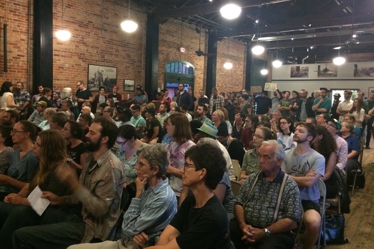 Over 100 residents packed the Ypsilanti Freighthouse for the special meeting.