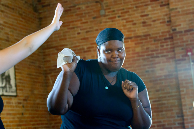 A performance of Voices From Ozone at the Ypsilanti Freighthouse