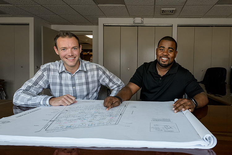 Zac Fosler and Marquan Jackson at the Ypsilanti Housing Commission