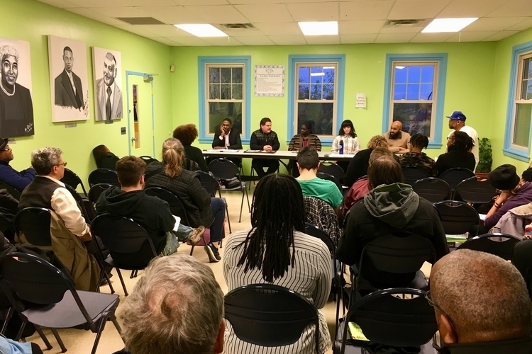 The audience and panel at the event.