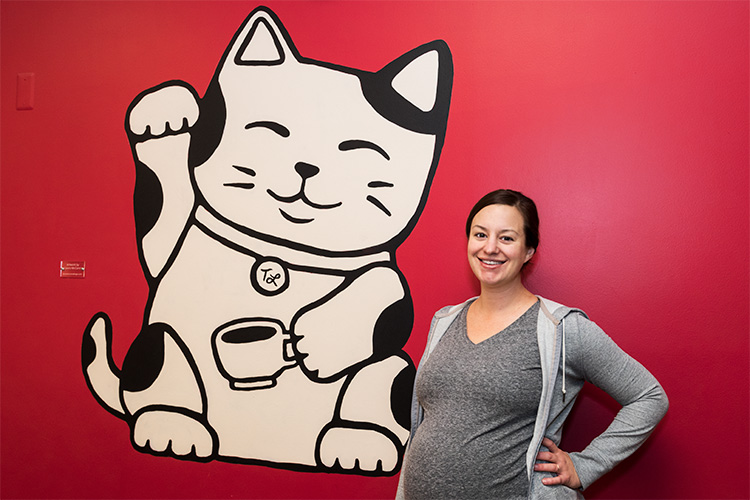 Yoga Instructor Lisa Norgren at a cat yoga class at Tiny Lions Lounge and Adoption Center