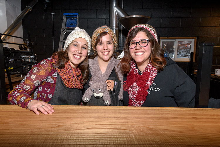 Cultivate knitting group members Bekah Wallace, Katie Morris and Hannah Williamson