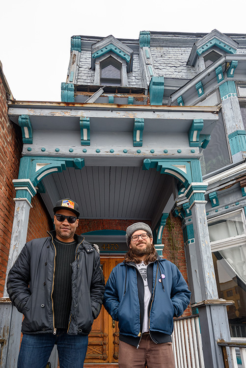 Adriel Thornton and Adriel Thornton standing outside of the former Zoot's location