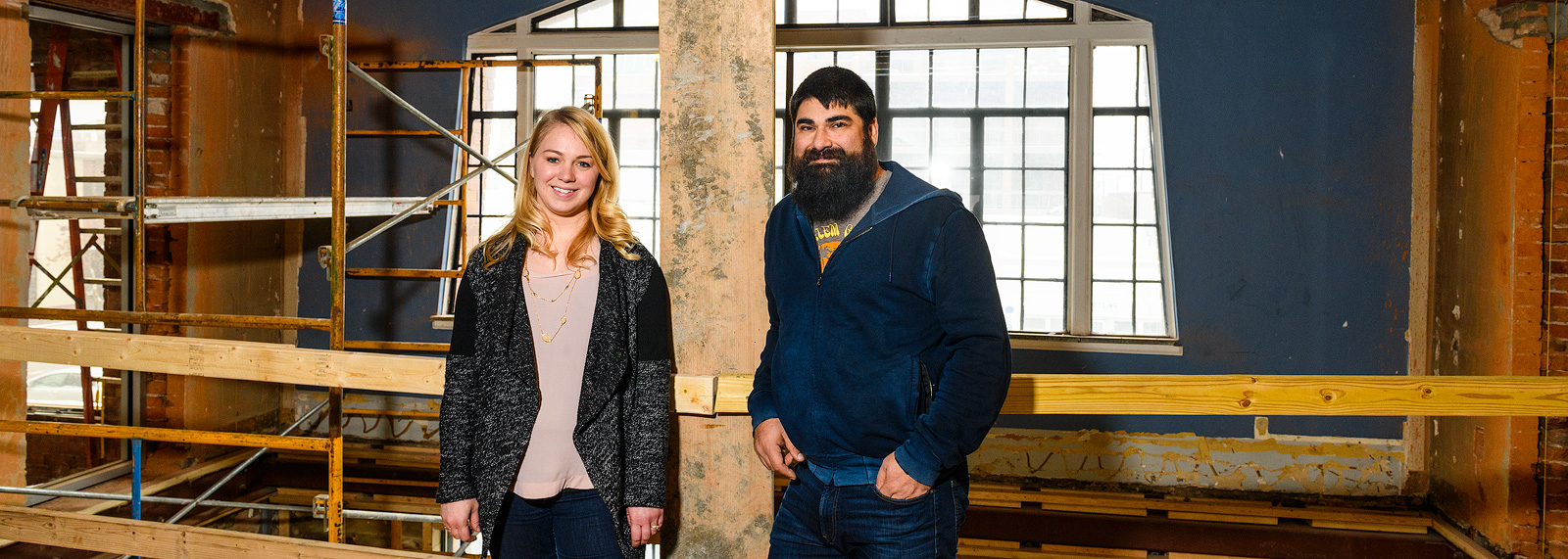 Alison Todak and Joe Malcoun on the second floor of the future lobby at Cahoots