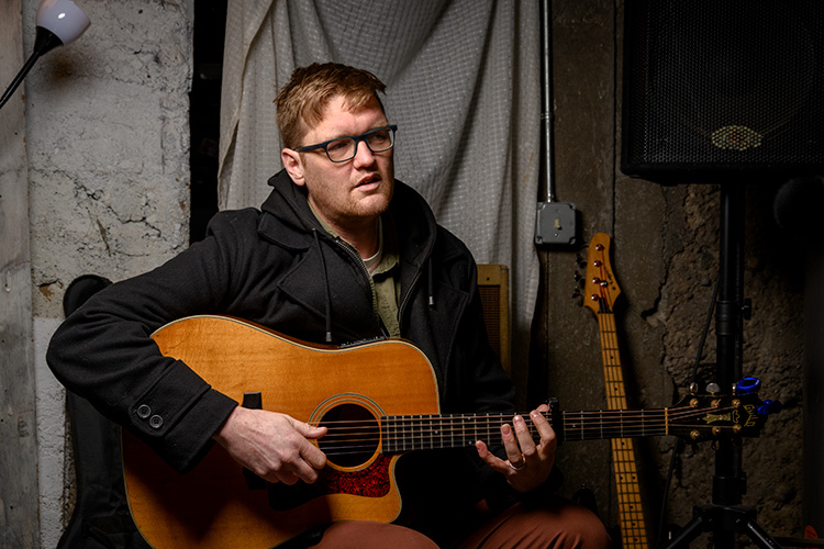 Matt Jones in his basement recording studio