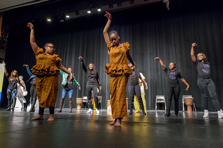 A performance at Ypsilanti High School before the class field trip to Black Panther
