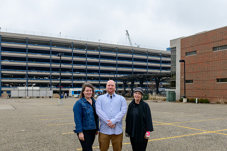 Jessica Letaw, Jarod Malestein and Kit McCullough in the Y Lot in downtown Ann Arbor