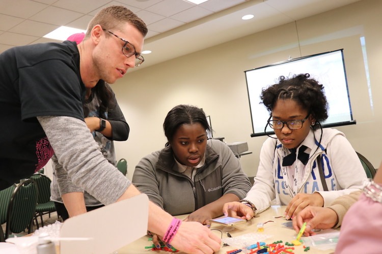 Girls participate in activities at the Digital Divas event.