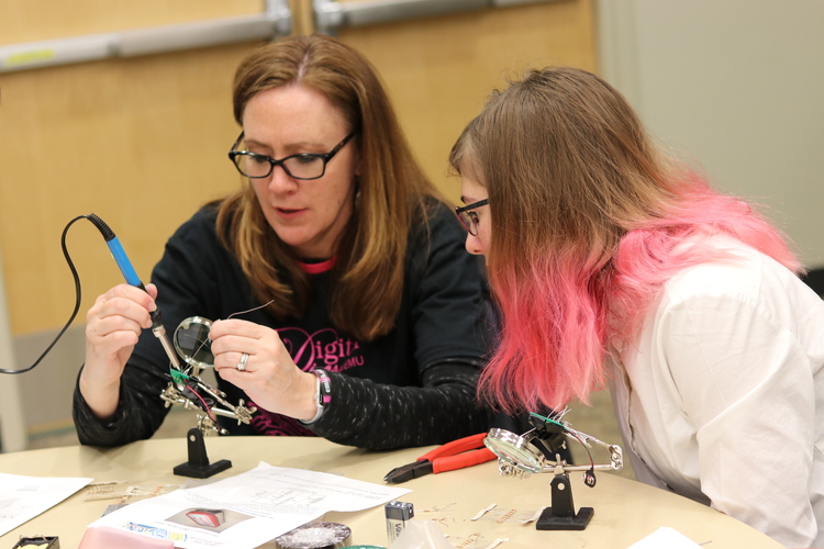 Girls participate in activities at the Digital Divas event.