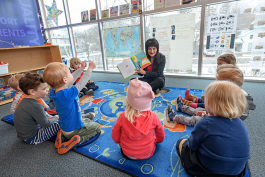 Toni Kayumi reading to kids at the Ann Arbor YMCA