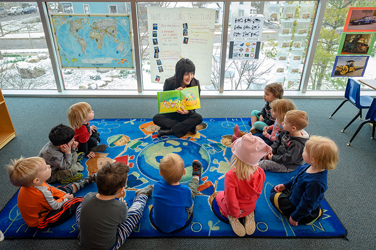 Toni Kayumi reading to kids at the Ann Arbor YMCA