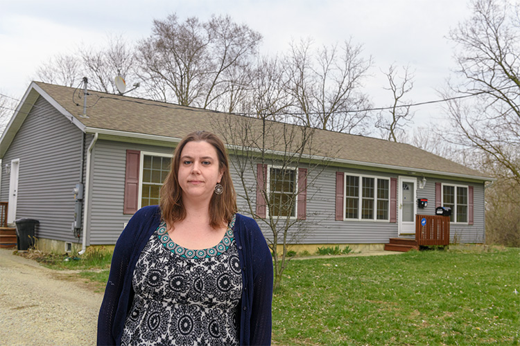 Erin Snyder outside her home on Bell Street.