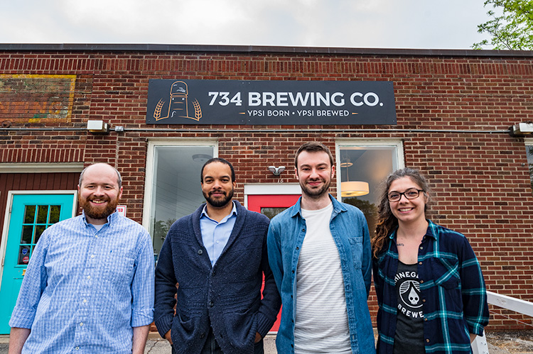 Patrick Echlin, Brian Jones-Chance, Alex Merz and Mariah Gavin outside of 734 Brewing Company in Depot Town Ypsilanti