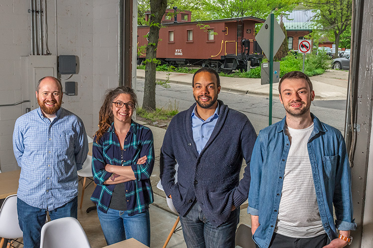 Patrick Echlin, Mariah Gavin, Brian Jones-Chance and Alex Merz inside of 734 Brewing Company