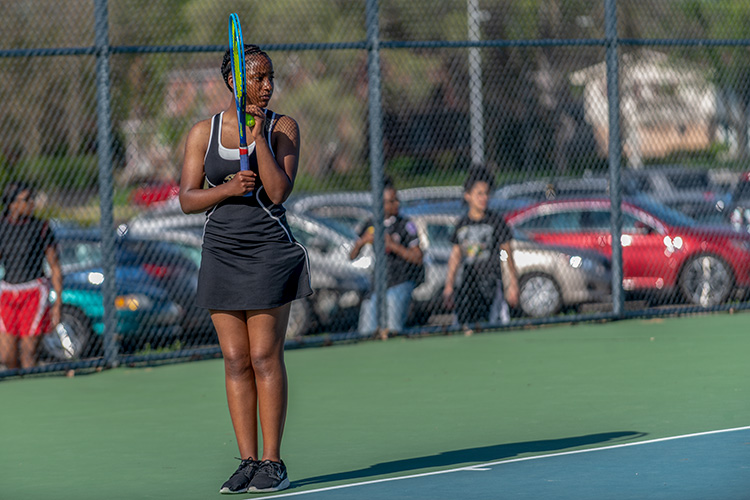 The YCHS Girls Tennis Team playing Lincoln High School 
