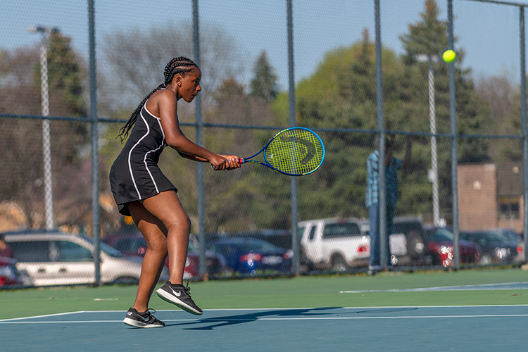 The YCHS Girls Tennis Team playing Lincoln High School 