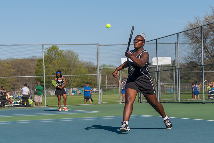 The YCHS Girls Tennis Team playing Lincoln High School 