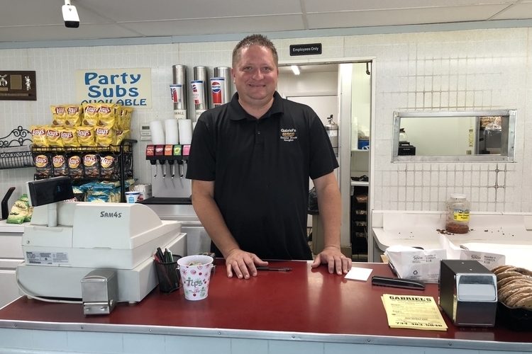 Donald Ballard behind the counter at Gabriel's Cheesesteak Hoagies.