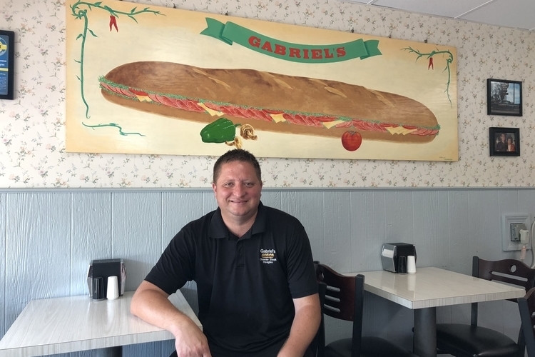 Don Ballard sits at Gabriel's Cheesesteak Hoagies.