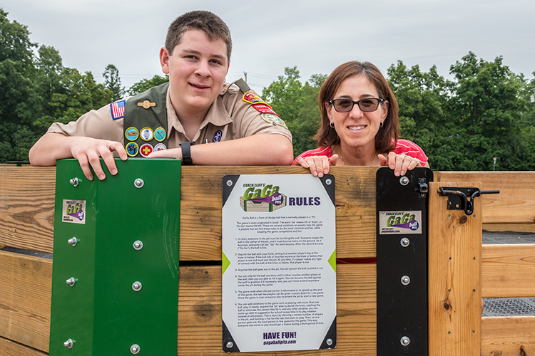 Josh and Jenn Carlson in the Gaga Pit they built with the help of Next Door