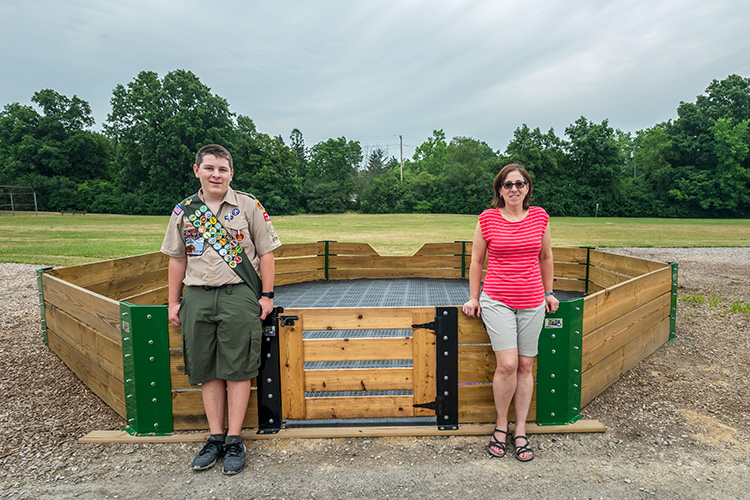 Josh and Jenn Carlson with the Gaga Pit they built with the help of Next Door