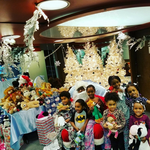These children are among 140 who received free Christmas presents last year from Joyful Treats.