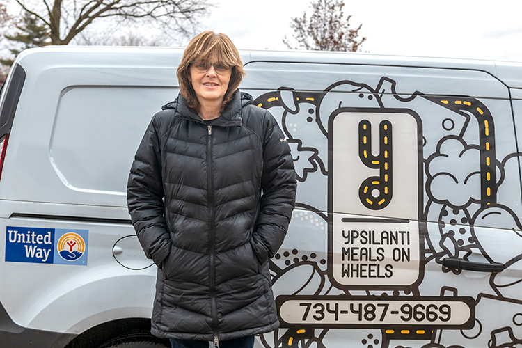 Casey Miller delivering meals for Ypsilanti Meals on Wheels