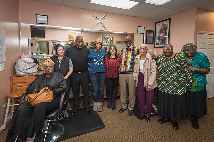 Shawn and Hala Green with employees, friends and customers at Finesse 1 Salon