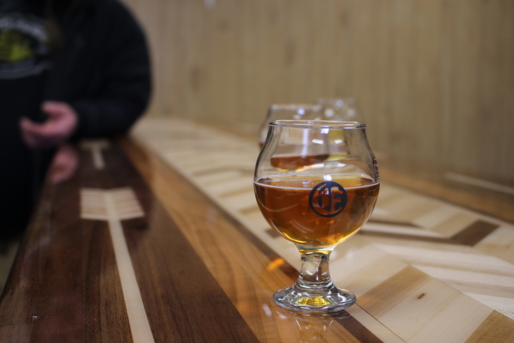 A glass of Edelbrau beer.