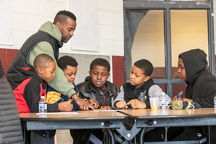 Washtenaw My Brother's Keeper 50 Strong breakfast at the former Willow Run Middle School