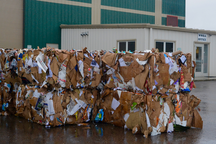 Cardboard to be recycled outside WWRA's office.