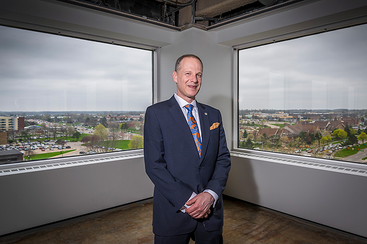 Oxford Companies CEO Jeff Hauptman in the future Oxford offices on the 8th floor of 777 E. Eisenhower.