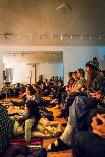 Audience members at The CoOp.