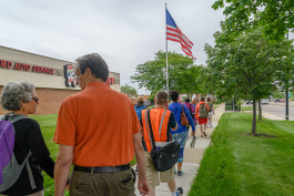 Participants in last year's Bridging 23 Unity Walk walk through Ann Arbor.