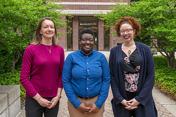 Katie Lopez, Raivynn Smith, and Kaisha Brezina at the U of M School of Social Work.