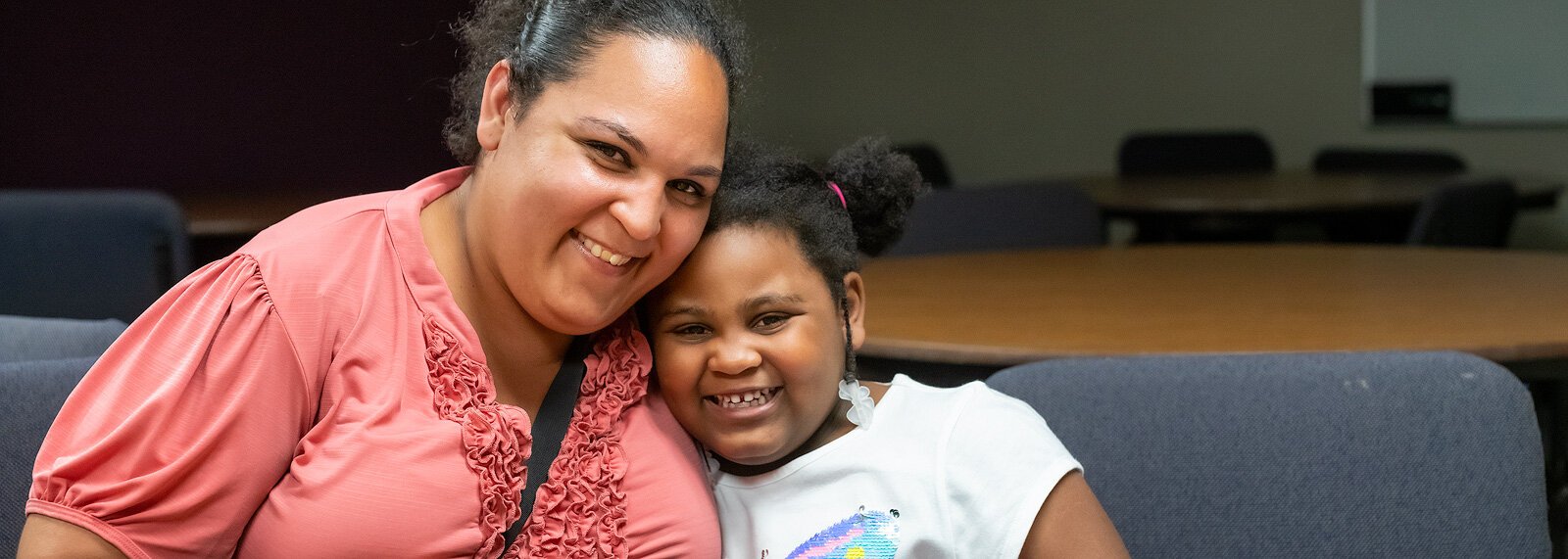 Aleishia Burrell, an early "leader" in the Circles program, and her daughter Brianna Washington