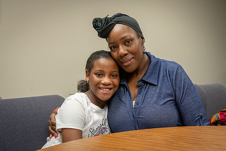 Niyah Carr with her mother Nikia Smith, a former "leader" in the Circles program who now works for Friends In Deed.