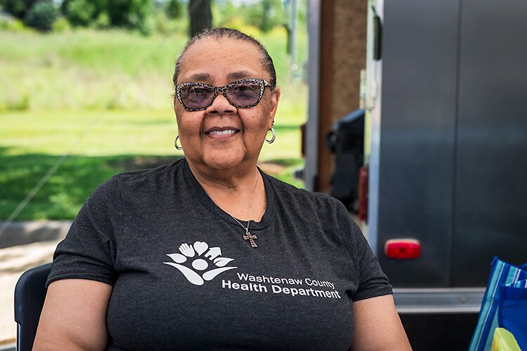 Washtenaw County community health worker Anne Davis at the Pittsfield Township Farmers Market.