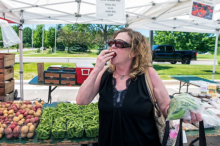 Prescription for Health client Carol Hollins at the Pittsfield Township Farmers Market.
