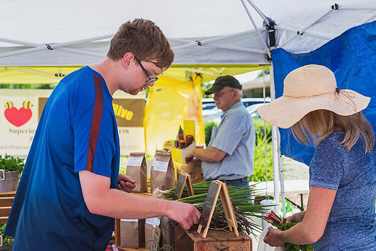 Prescription for Health client Jacob Smith at the Pittsfield Township Farmers Market.