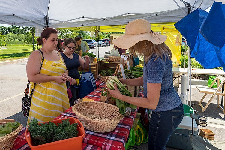 Prescription for Health clients Star and Amber Haag at the Pittsfield Township Farmers Market.