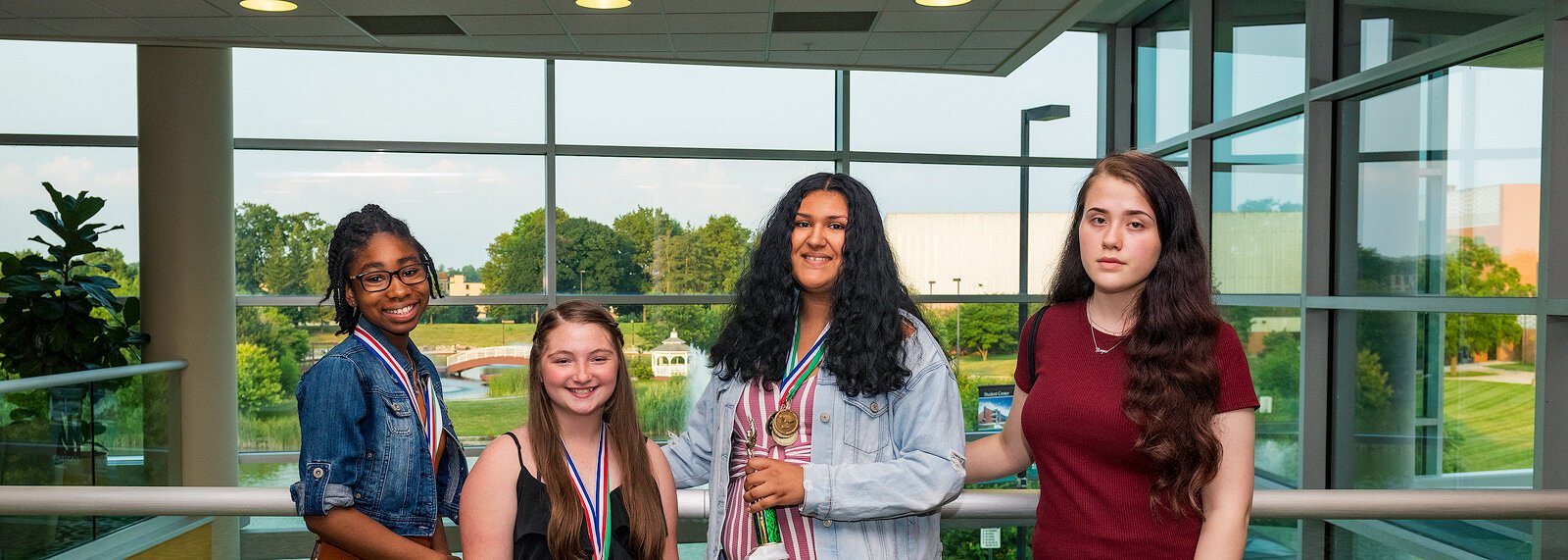 Upward Bound writing finalists Mareka Ray, Alexis Herron, Selena Calzado, and Cara Altherr. Davonna Washington not pictured.