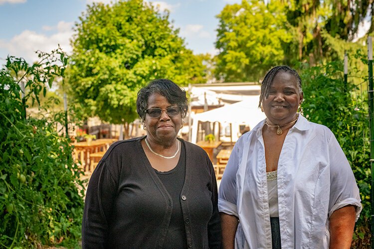 Omer Jean Winborn and Cheryl Garnett of the Washtenaw County African American Genealogy Society.