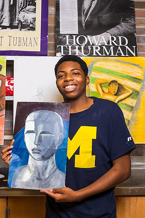 YCS student Jordan Murray with his art work.
