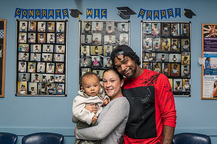 Sierra and David Morton with their son David Jr. at at the Washtenaw County WIC office. 