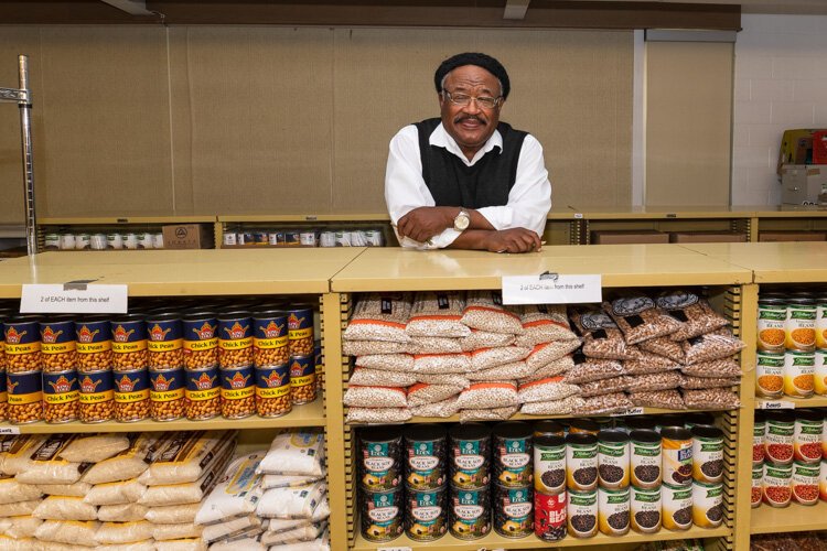 Pastor Robert L. Ford at the Greater Faith Transition Center's food pantry.