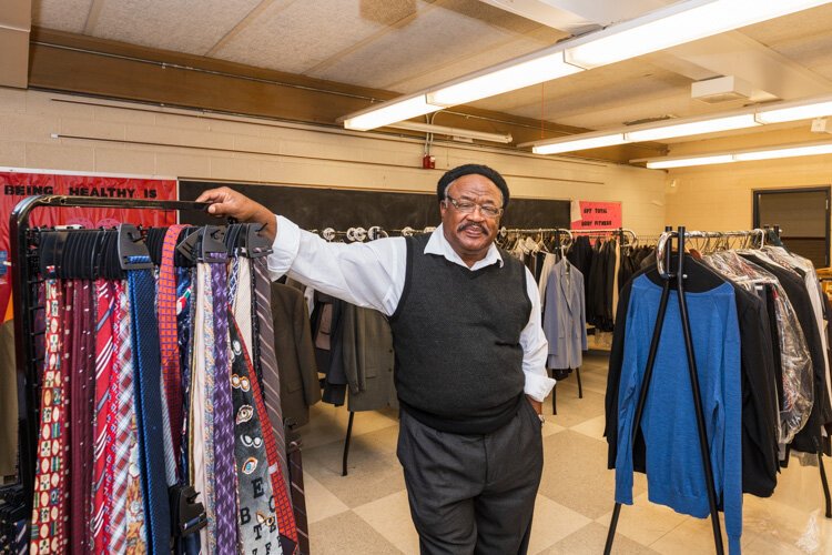 Pastor Robert L. Ford at the men's clothing closet at the Greater Faith Transition Center.