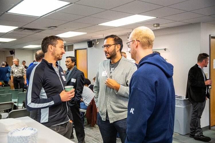 Attendees chat at A2.AI.